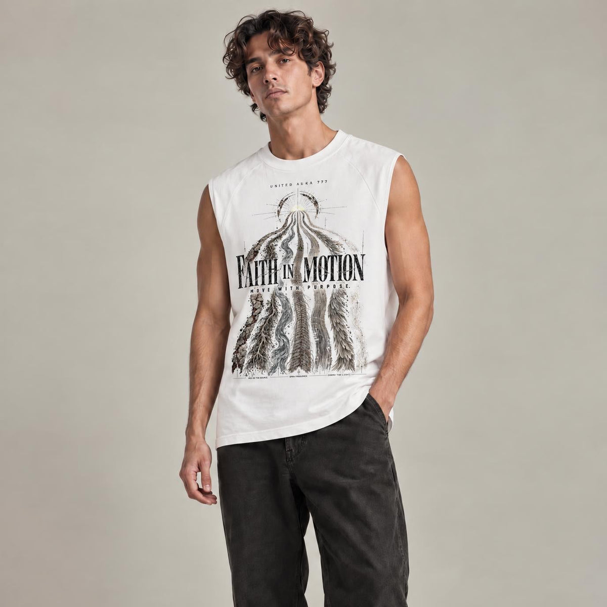 A man modeling a sleeveless white graphic t-shirt with a black illustration and the text 'FAITH IN MOTION' on the front, paired with dark gray pants and white sneakers, against a neutral studio background.